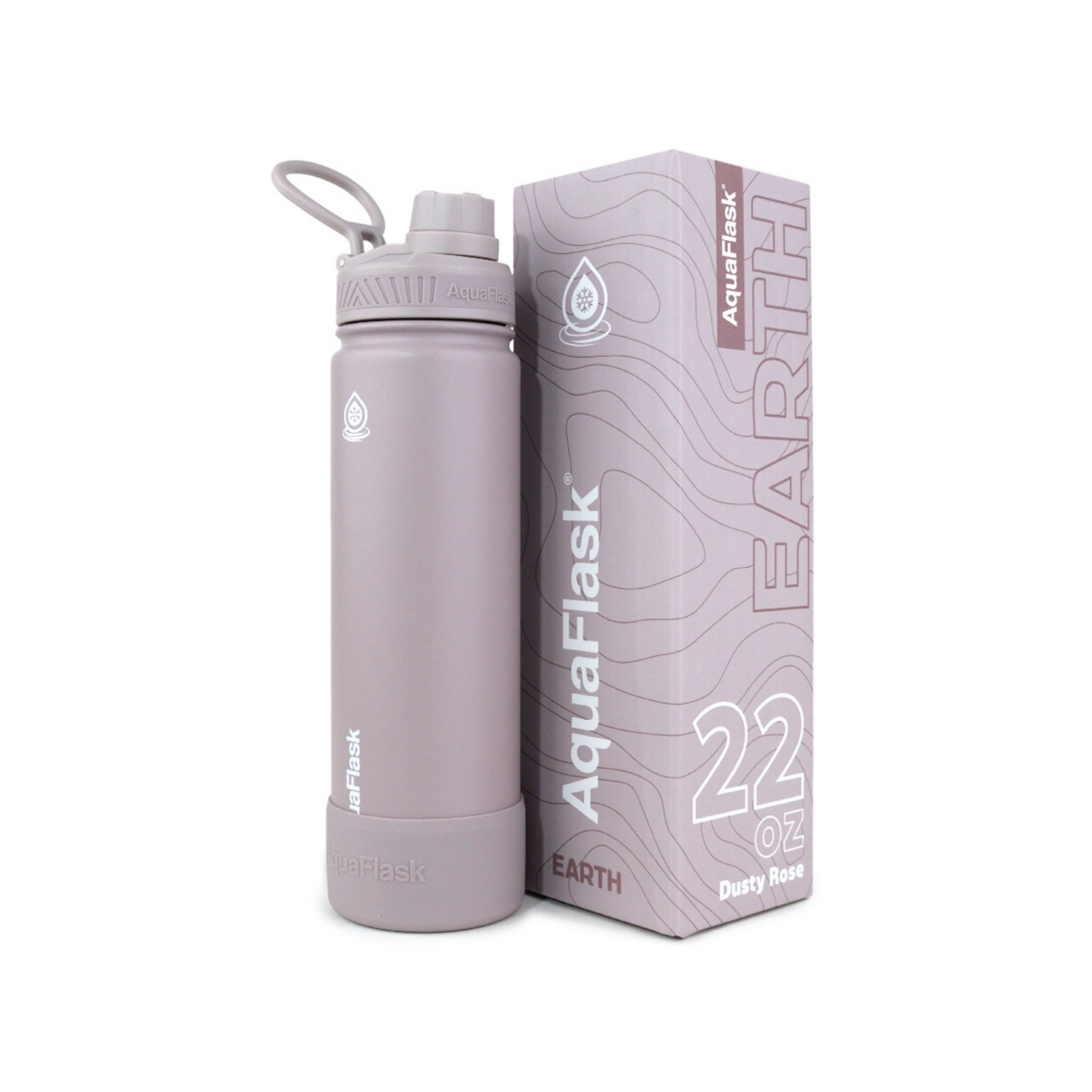 Lila AquaFlask Earth Collection Edelstahl Trinkflasche 650 ml (22 oz) mit Schraubdeckel, Haltegriff und Schutz-Boot neben Originalverpackung in Dusty Rose