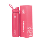 Pinke AquaFlask Regular Edelstahl Trinkflasche 650 ml (22 oz) mit Flip-Top-Sportdeckel neben Originalverpackung in Flamingo