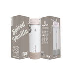 Beige AquaFlask Colorwave Flip Sip Lid Collection Edelstahl Trinkflasche 650 ml (22 oz) mit Flip-Sip-Deckel neben Originalverpackung in Spiced Vanilla