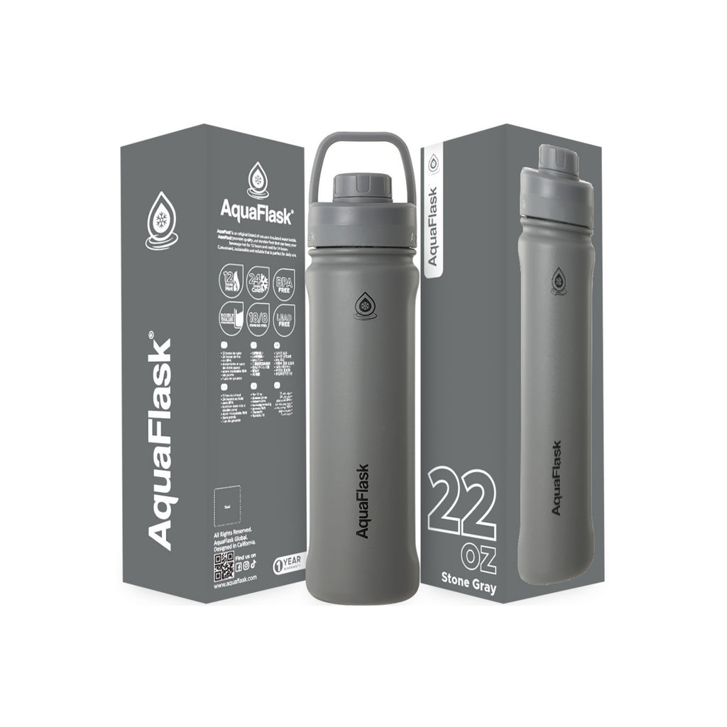 Grau AquaFlask Sports Lid Bottle Edelstahl Trinkflasche 650 ml (22 oz) mit Sports Lid und Haltegriff neben Originalverpackung in Stone Gray